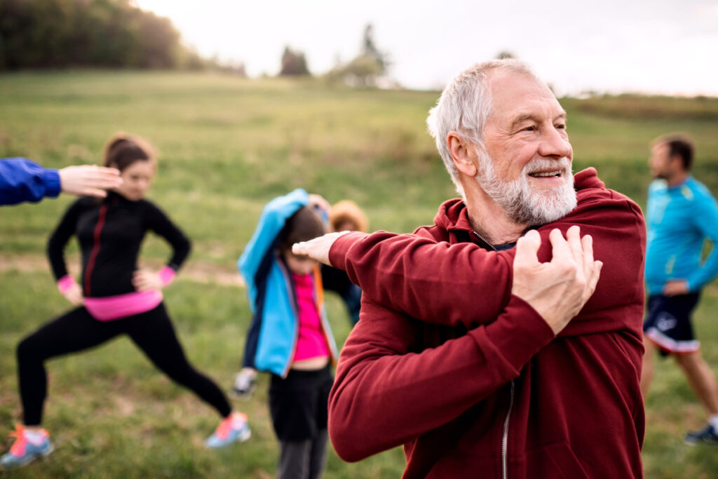 Elderly man exercising outside