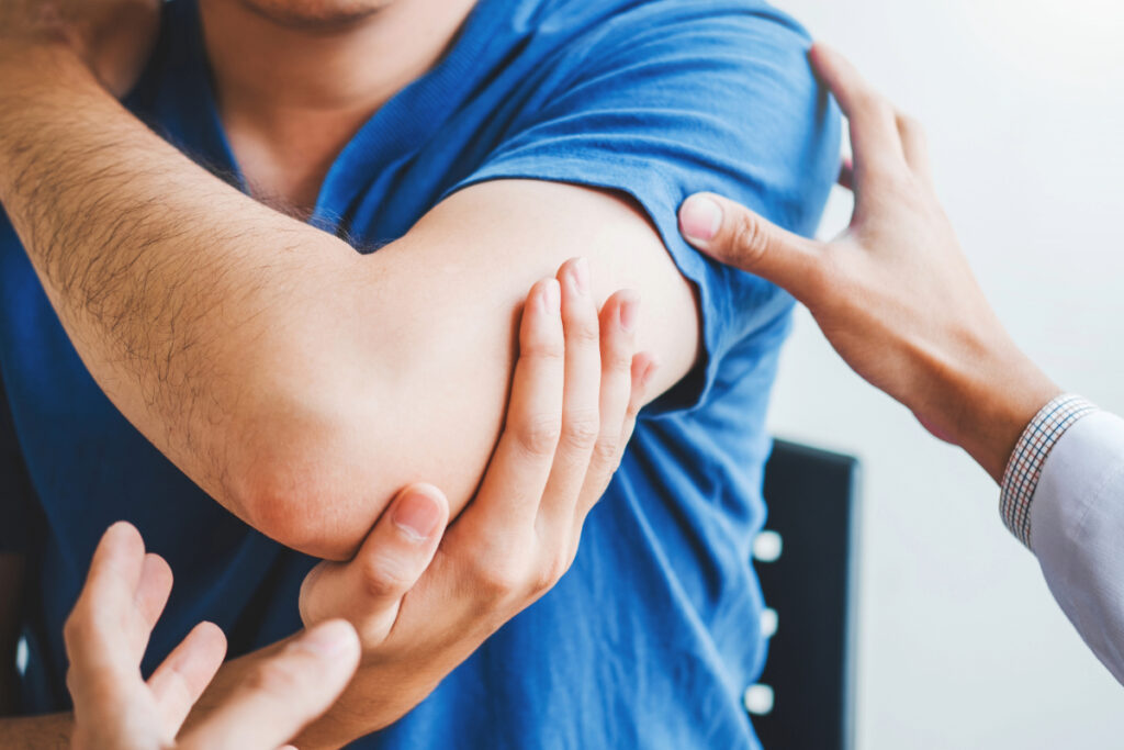 Physical Therapist Consulting with Patient